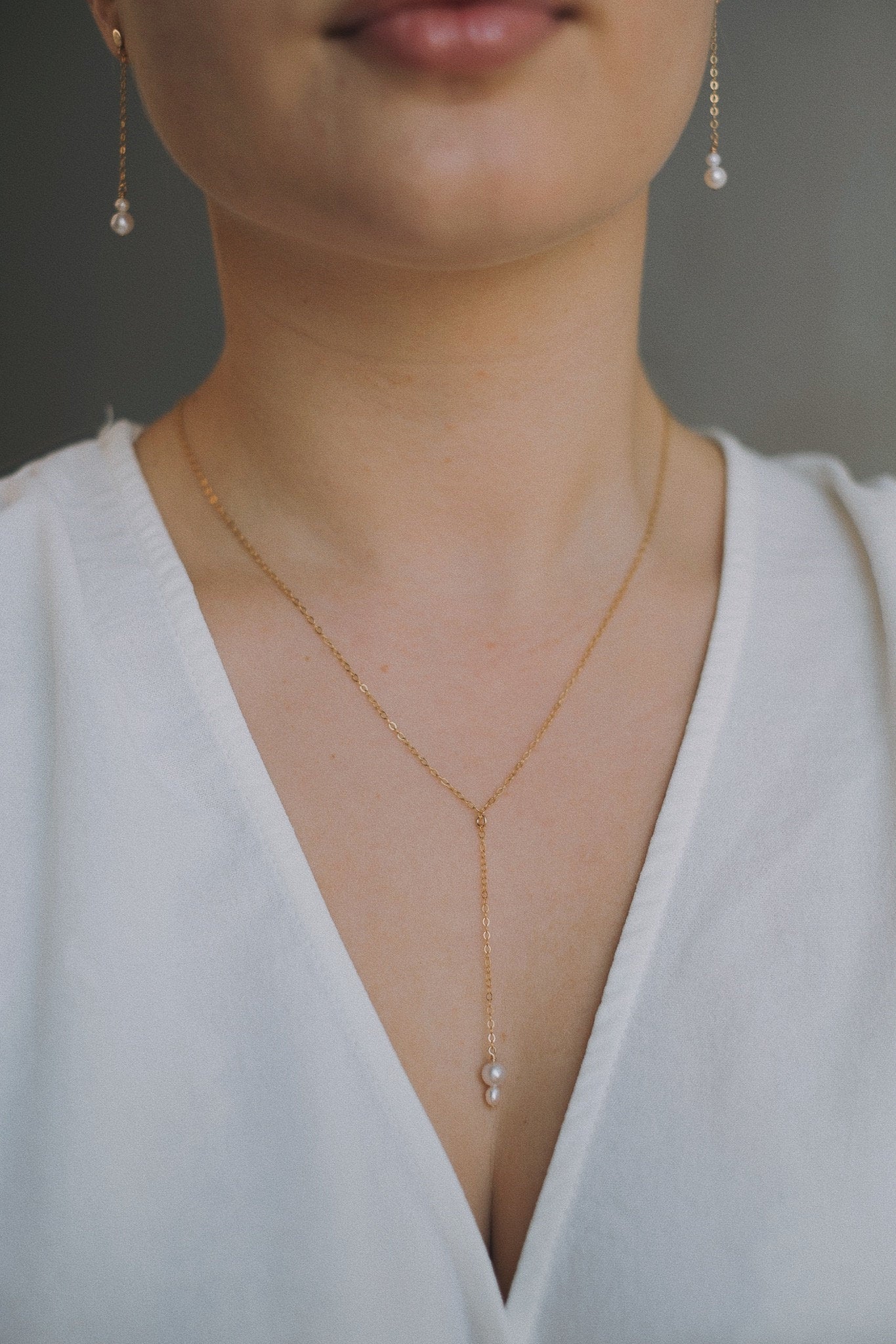 Feine Y Kette mit Perlen Gold