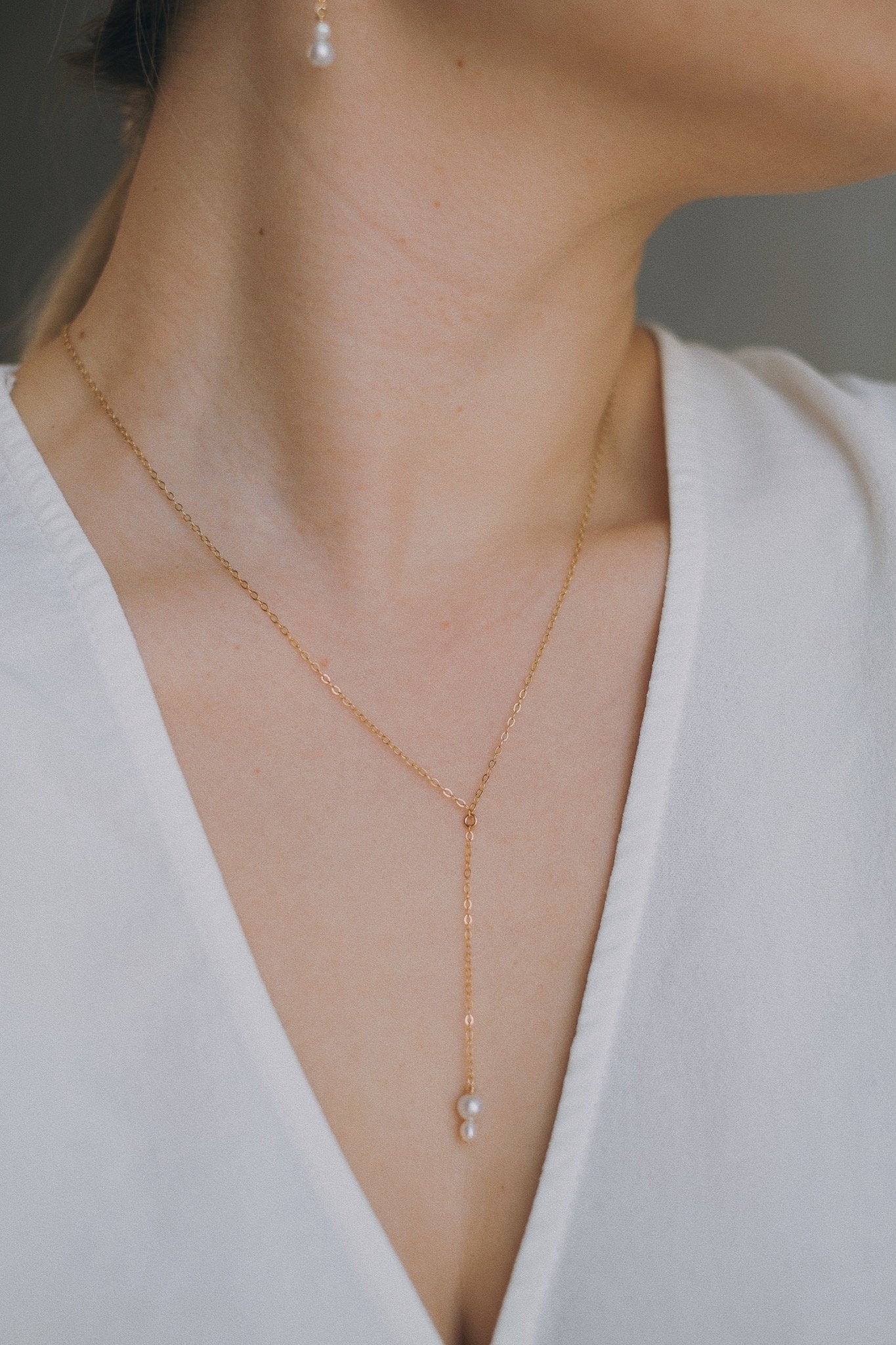 Feine Y Kette mit Perlen Gold