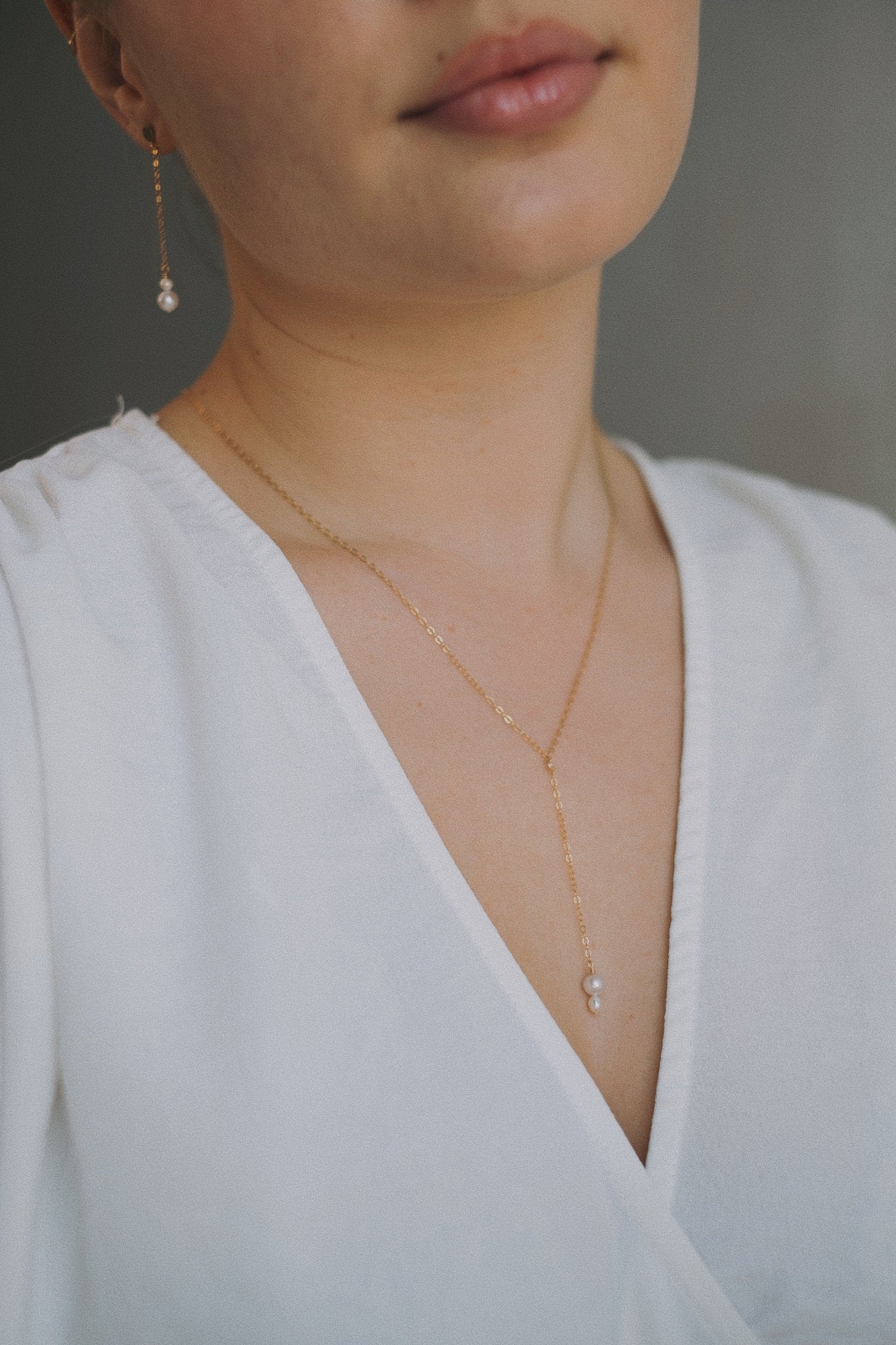 Feine Y Kette mit Perlen Gold