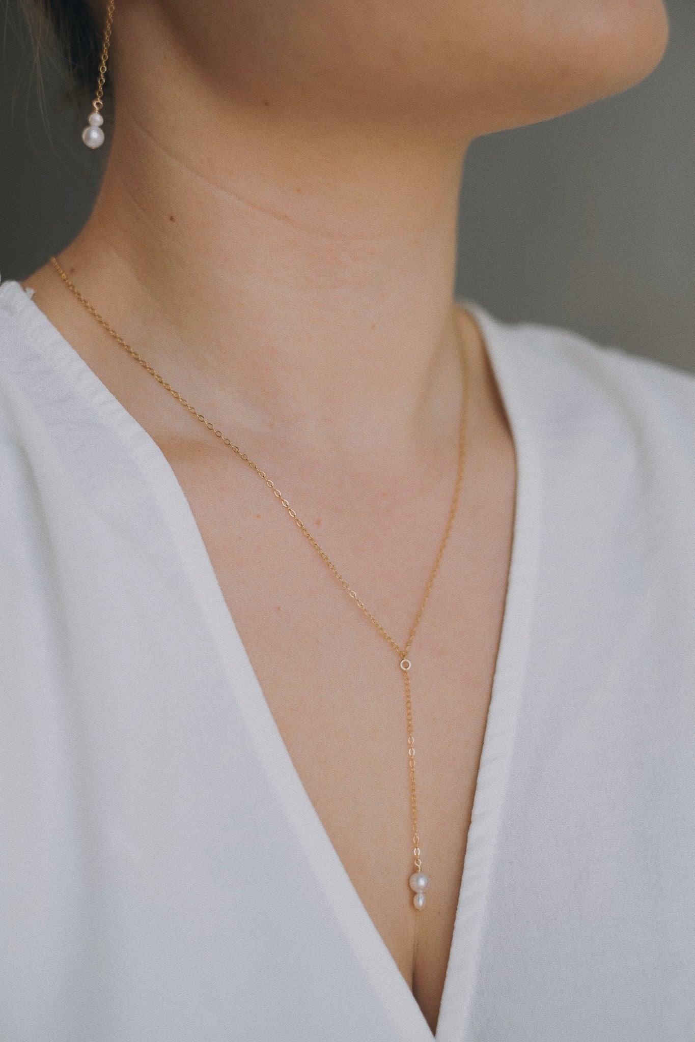 Feine Y Kette mit Perlen Gold